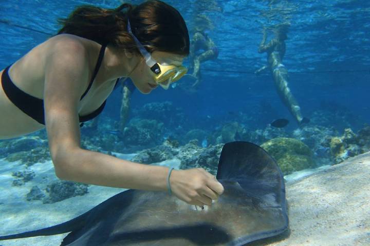 a woman in a pool of water