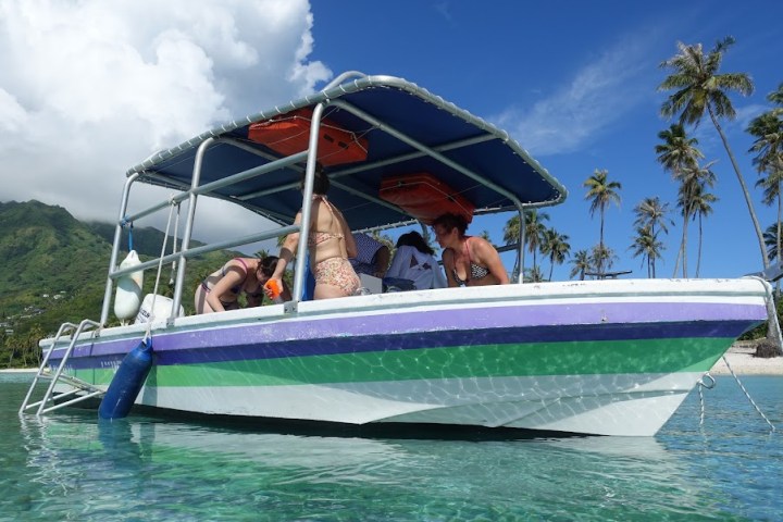 a small boat in a body of water