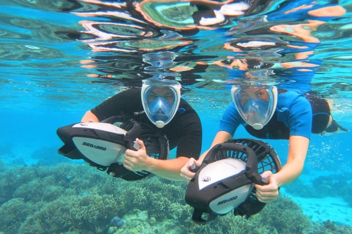 a person swimming in a pool of water